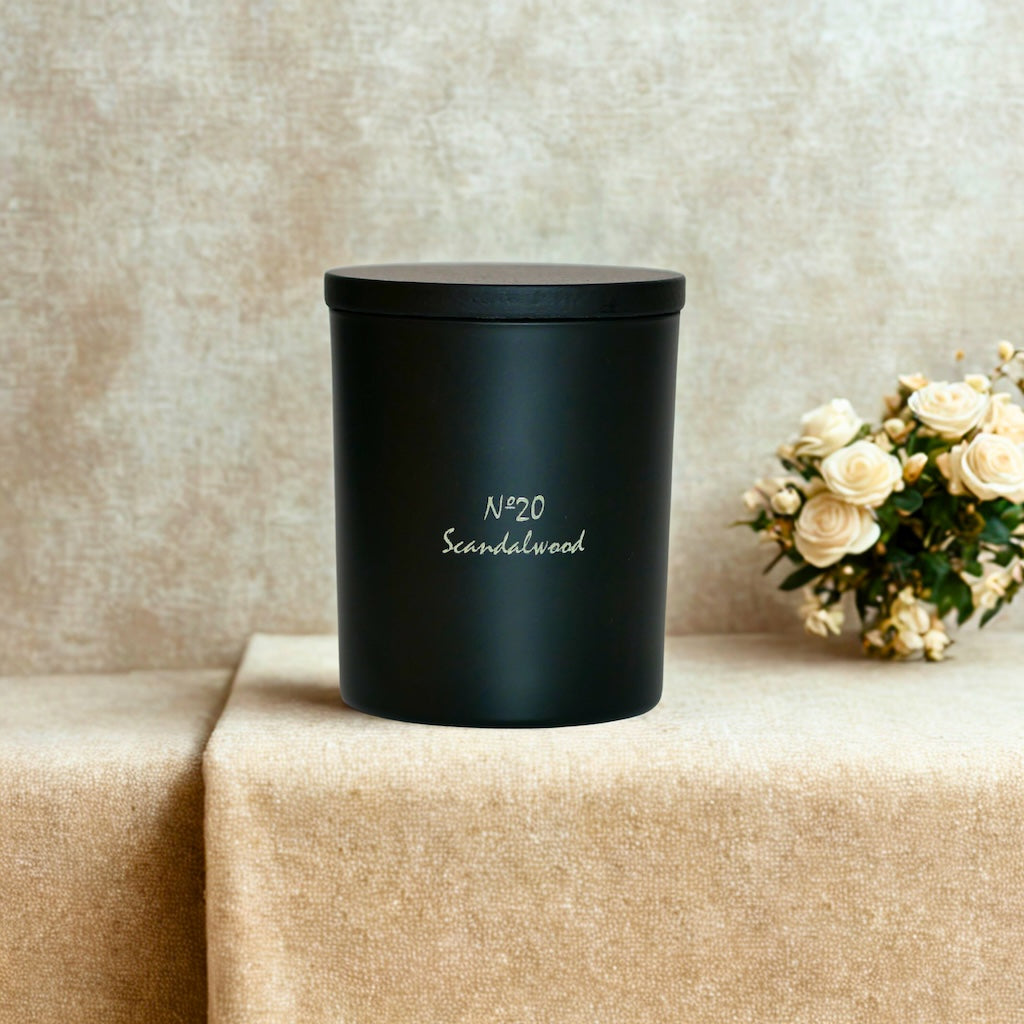 Scandalwood signature candle by Chiije, front view on a neutral surface