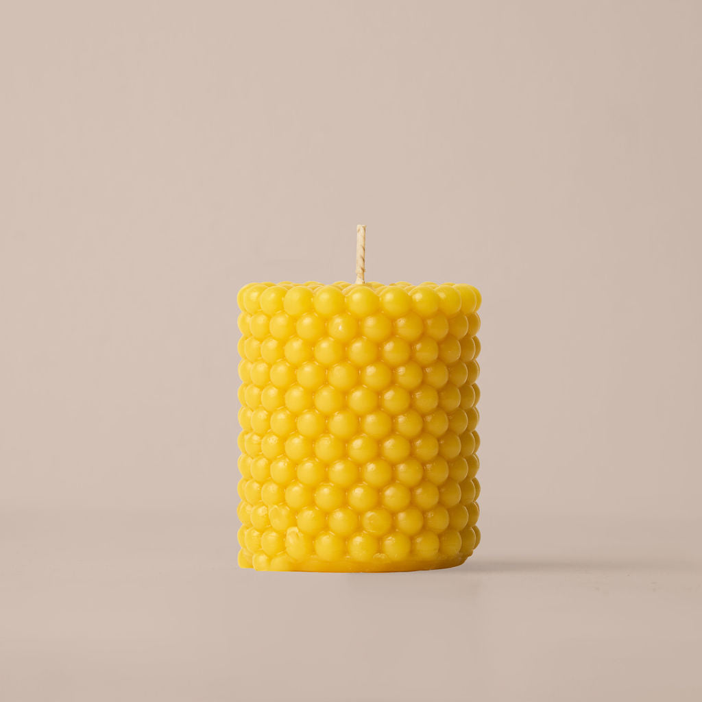 Nordic Fjord 008 bubble pillar candle made from pure beeswax.