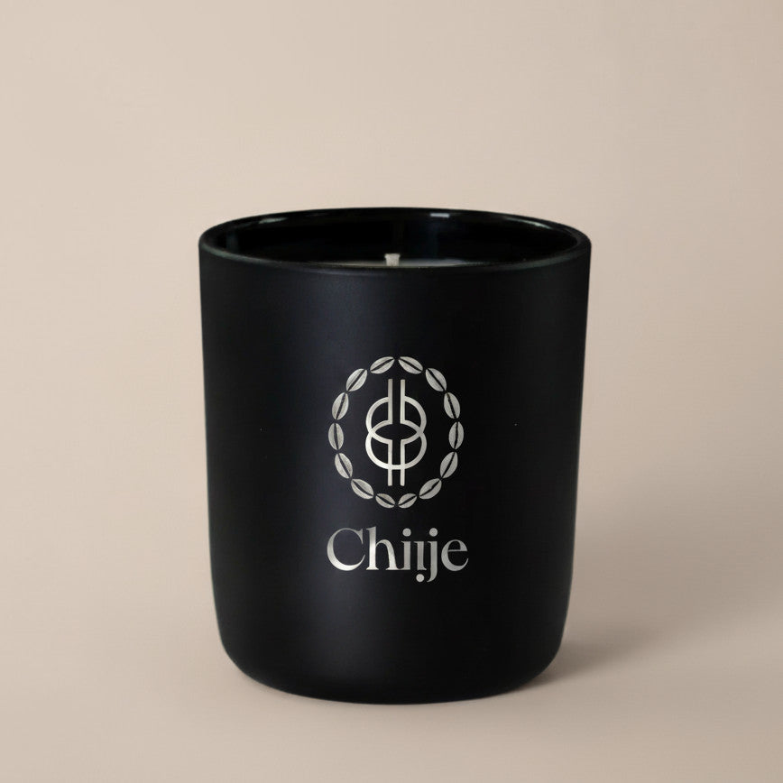 Scandalwood luxury candle in amber tones, hand-poured natural wax by Chiije